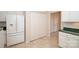 Kitchen features white appliances, ample cabinet space, and pantry storage at 10034 Bishops Gate Blvd, Pineville, NC 28134
