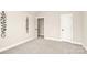 Neutral bedroom with soft carpet and white walls features a closet and wall decor at 1011 Duntov Dr, Monroe, NC 28110