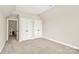 Bedroom featuring neutral walls and carpet, and two closets at 1011 Duntov Dr, Monroe, NC 28110