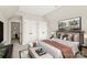 Well-appointed bedroom with contemporary furniture, closet space, and elegant decor at 1011 Duntov Dr, Monroe, NC 28110