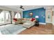 Stylish living room with a comfortable sofa, hardwood floors, and access to the outdoors at 1011 Duntov Dr, Monroe, NC 28110