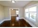 Dining area featuring hardwood floors, neutral paint, and bright windows that bring in natural light at 104 N 9Th St, Bessemer City, NC 28016