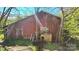 Rustic barn with wooden siding, offering potential for storage or workshop space at 1116 Medlin Rd, Monroe, NC 28112