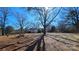 Charming home featuring a spacious front yard with mature trees and a sunny exposure at 1116 Medlin Rd, Monroe, NC 28112