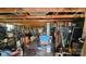 Spacious and well-lit interior with exposed wooden beams, perfect for customization and storage at 1116 Medlin Rd, Monroe, NC 28112