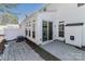 View of a backyard patio surrounded by white fencing and an air conditioning unit at 128 S Arcadian Way, Mooresville, NC 28117