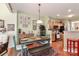 Open concept dining area with a charming table setup next to the kitchen at 128 S Arcadian Way, Mooresville, NC 28117