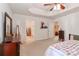View of spacious bedroom showing neutral walls and multiple doorways to other rooms at 128 S Arcadian Way, Mooresville, NC 28117