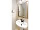 Powder room featuring a stylish vanity, sink, and matte black hardware at 13811 Waverton Ln, Huntersville, NC 28078