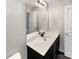 Bathroom features a modern sink and vanity with plenty of counter space at 13811 Waverton Ln, Huntersville, NC 28078