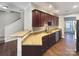 Updated kitchen featuring granite countertops, cherry cabinets, and stainless dishwasher at 13811 Waverton Ln, Huntersville, NC 28078