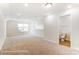 Well-lit bonus room with carpeting and an adjacent half bathroom for added convenience at 146 Prestwick Way # 20, Mooresville, NC 28115