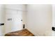 Utility room with hookups, bright walls, and wood floor at 146 Prestwick Way # 20, Mooresville, NC 28115