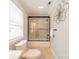 Cozy bathroom showcasing a glass-enclosed shower, toilet, and granite-topped vanity at 165 Blue Ridge Trl, Mooresville, NC 28117