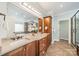 Bathroom with granite countertops, double sinks, and a walk-in shower at 165 Blue Ridge Trl, Mooresville, NC 28117