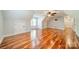 An expansive bonus room featuring hardwood floors, dormer windows, and bright neutral paint at 165 Blue Ridge Trl, Mooresville, NC 28117