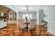 Elegant dining room with wainscoting, modern lighting, and hardwood floors with beautiful chair railing at 165 Blue Ridge Trl, Mooresville, NC 28117