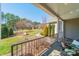Inviting front yard with manicured landscaping, mature trees, and a well-maintained lawn creating a beautiful curb appeal at 165 Blue Ridge Trl, Mooresville, NC 28117