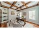 Charming office space featuring a coffered ceiling, built-in shelving, and a stylish work desk at 165 Blue Ridge Trl, Mooresville, NC 28117