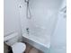 Bathroom featuring a shower-tub combo and a toilet, designed for functionality and ease of use at 1806 Bringle Ferry Rd, Salisbury, NC 28146