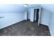Bedroom featuring neutral walls and carpet, doorways to other rooms and a closet at 1806 Bringle Ferry Rd, Salisbury, NC 28146