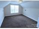 Bedroom with neutral carpet and walls, and a window to bring in natural light at 1806 Bringle Ferry Rd, Salisbury, NC 28146
