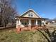 Charming exterior of a well-maintained one-story home featuring a cozy front porch at 1806 Bringle Ferry Rd, Salisbury, NC 28146