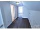 Hallway featuring neutral walls and carpet with doorways to other rooms of the house at 1806 Bringle Ferry Rd, Salisbury, NC 28146
