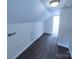 Hallway featuring neutral walls and carpet with doorways to other rooms at 1806 Bringle Ferry Rd, Salisbury, NC 28146