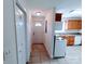Bright kitchen featuring white appliances and wood cabinets, offering a functional cooking space at 1806 Bringle Ferry Rd, Salisbury, NC 28146