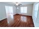 Bright living room featuring gleaming hardwood floors, fresh paint and abundant natural light at 1806 Bringle Ferry Rd, Salisbury, NC 28146