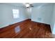 Spacious living room with hardwood floors, a ceiling fan, and large window for lots of light at 1806 Bringle Ferry Rd, Salisbury, NC 28146