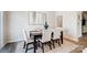 Cozy dining room featuring a dark wood table, upholstered chairs, and neutral decor at 2310 Hedgecliff Rd # 159, Kannapolis, NC 28025