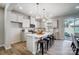Modern kitchen with white cabinets, a spacious island with seating, and stainless steel appliances at 2310 Hedgecliff Rd # 159, Kannapolis, NC 28025