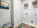 Convenient laundry room with a utility sink, storage shelves, and washer/dryer connections at 2310 Hedgecliff Rd # 159, Kannapolis, NC 28025