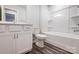 Bathroom featuring a vanity, toilet, and shower-tub combination with tile walls at 2320 Hedgecliff Rd # 158, Kannapolis, NC 28025