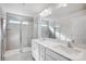 Bathroom features a double sink vanity, large mirror, and glass shower with tile surround at 2320 Hedgecliff Rd # 158, Kannapolis, NC 28025