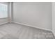 Bright bedroom featuring neutral walls, plush carpet flooring, and bright windows at 2320 Hedgecliff Rd # 158, Kannapolis, NC 28025