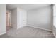 Cozy bedroom with plush carpet flooring, neutral walls, and double door closet at 2320 Hedgecliff Rd # 158, Kannapolis, NC 28025