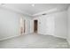 Bright bedroom featuring carpet, neutral walls, and an ensuite bathroom and closet at 2320 Hedgecliff Rd # 158, Kannapolis, NC 28025
