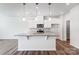 Modern kitchen with white cabinets, stainless steel appliances, granite countertops, and pendant lighting at 2320 Hedgecliff Rd # 158, Kannapolis, NC 28025