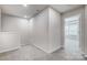 Upstairs landing with soft carpet, neutral wall color, and easy access to several rooms at 2320 Hedgecliff Rd # 158, Kannapolis, NC 28025