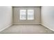 Bedroom with neutral paint, carpet floors, and double windows at 2330 Hedgecliff Rd # 157, Kannapolis, NC 28025