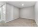 Neutral bedroom with light-colored walls and carpet at 2330 Hedgecliff Rd # 157, Kannapolis, NC 28025