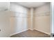 Walk-in closet features neutral paint, carpet floors, and built-in metal shelving at 2330 Hedgecliff Rd # 157, Kannapolis, NC 28025