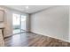 Dining area showcasing wood flooring, neutral walls, and sliding glass door at 2330 Hedgecliff Rd # 157, Kannapolis, NC 28025