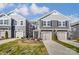 Charming townhome featuring a one-car garage, beautiful landscaping, and a well-maintained lawn at 2330 Hedgecliff Rd # 157, Kannapolis, NC 28025