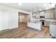 Kitchen with stainless appliances and granite countertop island, adjacent to the living room at 2330 Hedgecliff Rd # 157, Kannapolis, NC 28025