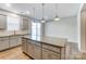 Bright kitchen features granite countertops, stainless steel appliances, and pendant lighting at 2330 Hedgecliff Rd # 157, Kannapolis, NC 28025