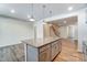 Modern kitchen with granite island, stainless steel appliances, and hardwood floors at 2330 Hedgecliff Rd # 157, Kannapolis, NC 28025